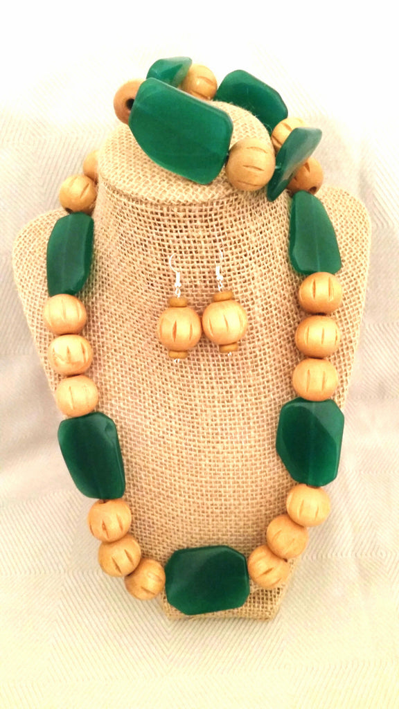 A Touch Of Colorful Teal Goes Very Nicely With These Light and Detailed Wooden Beads