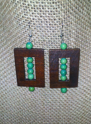 Earth Tones Along With This Unique Design Make These Earrings A Beautiful Addition To Your Accessories